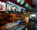 Spirituosenbalken und Kombisäule – Bar le 55, Obernai (Frankreich)